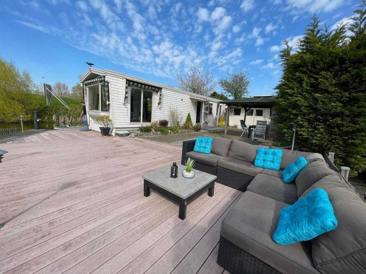 Fantastic Villa In Ooltgensplaat With Jetty Exterior photo